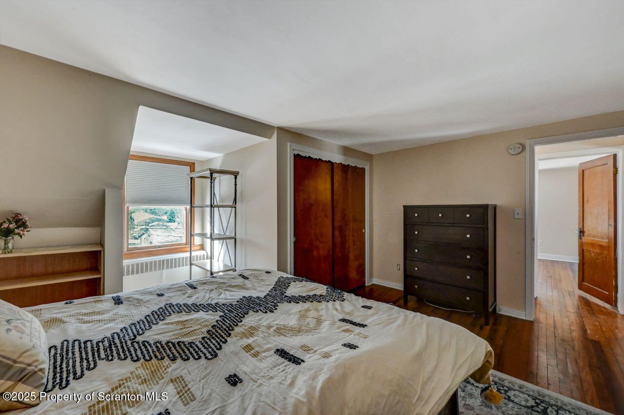 117 Griffin Pond Road Clarks Summit, PA 18411 - Photo 38 of 65 a bedroom with a bed and a dresser