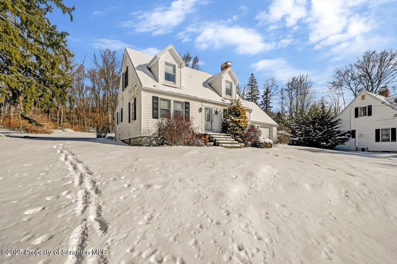 117 Griffin Pond Road Clarks Summit, PA 18411 - Photo 4 of 65 a view of multiple houses with a yard
