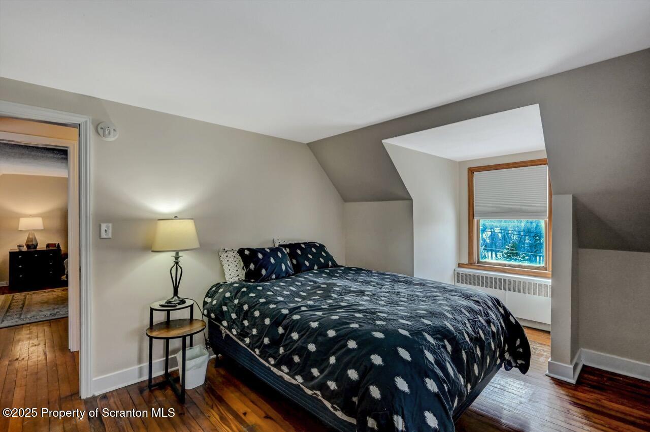 117 Griffin Pond Road Clarks Summit, PA 18411 - Photo 42 of 65 a bedroom with a bed and a window