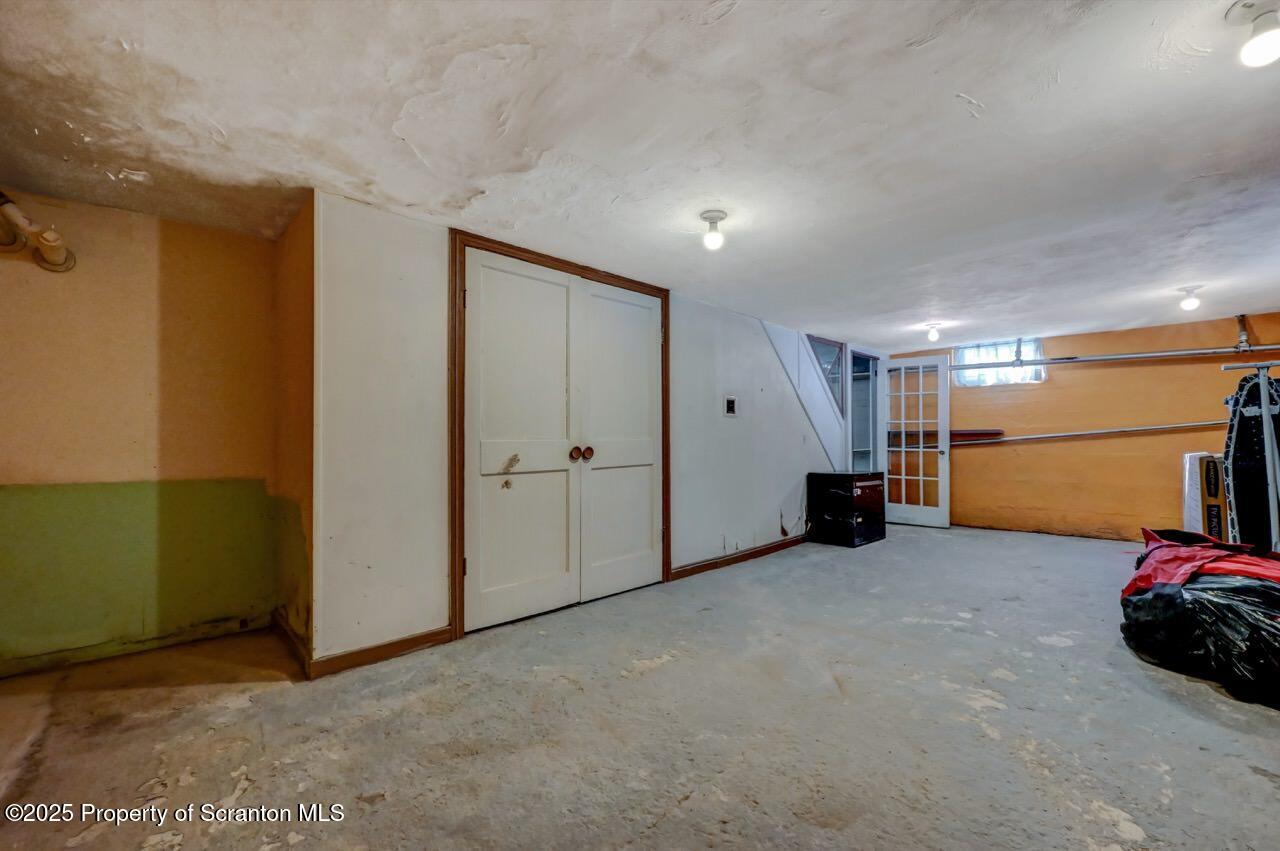 117 Griffin Pond Road Clarks Summit, PA 18411 - Photo 52 of 65 a view of a livingroom with a furniture and a garage