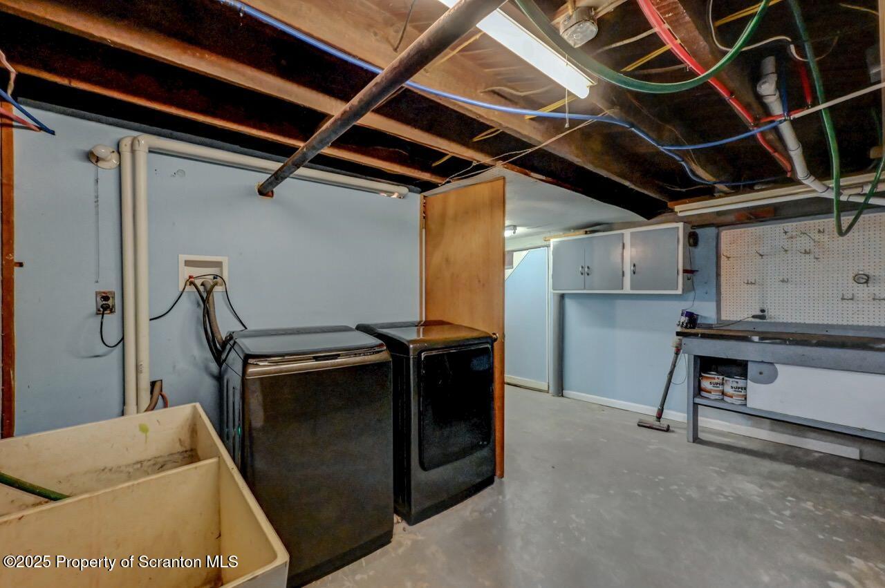 117 Griffin Pond Road Clarks Summit, PA 18411 - Photo 57 of 65 a utility room with dryer and washer