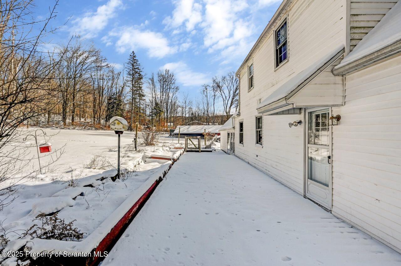 117 Griffin Pond Road Clarks Summit, PA 18411 - Photo 60 of 65 a view of a terrace with trees