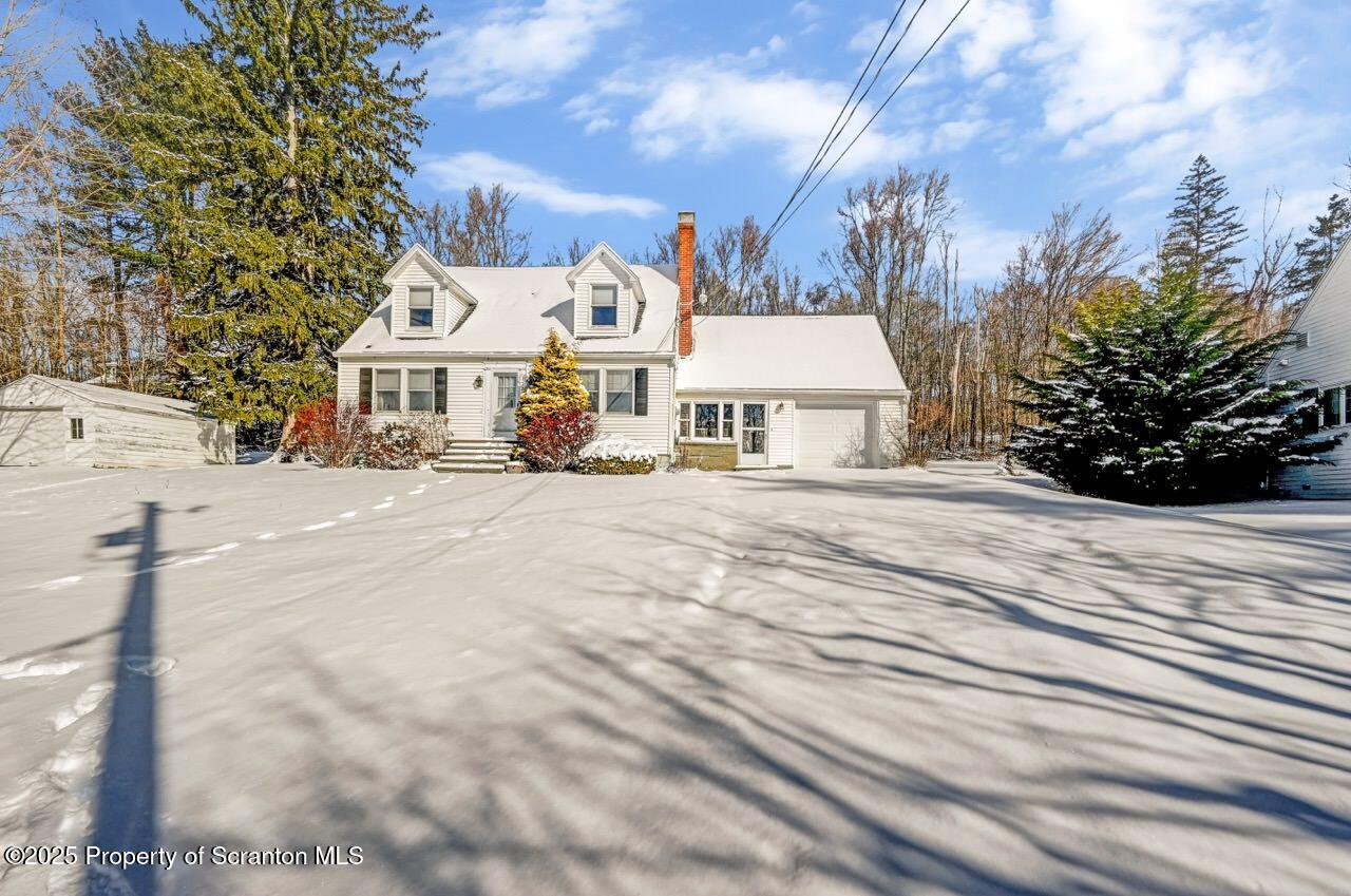 117 Griffin Pond Road Clarks Summit, PA 18411 - Photo 63 of 65 a view of a white house with a street