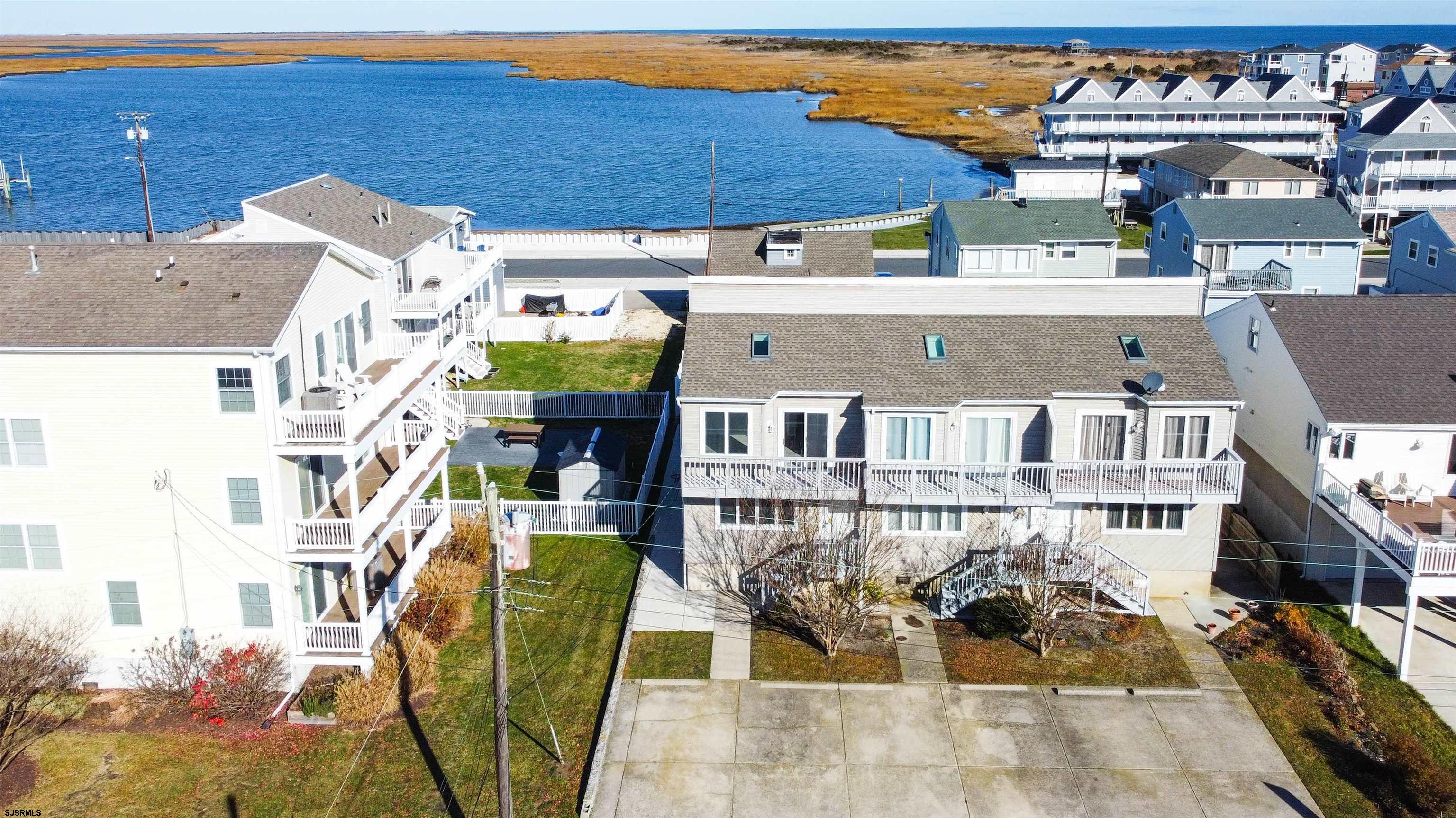 101 11th Street North, Unit A Brigantine, NJ 08203 - Photo 16 of 42 an aerial view of a house with swimming pool and sitting area
