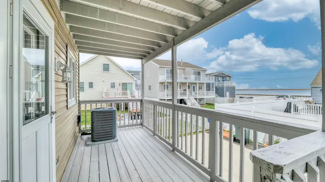 a view of a building with a porch