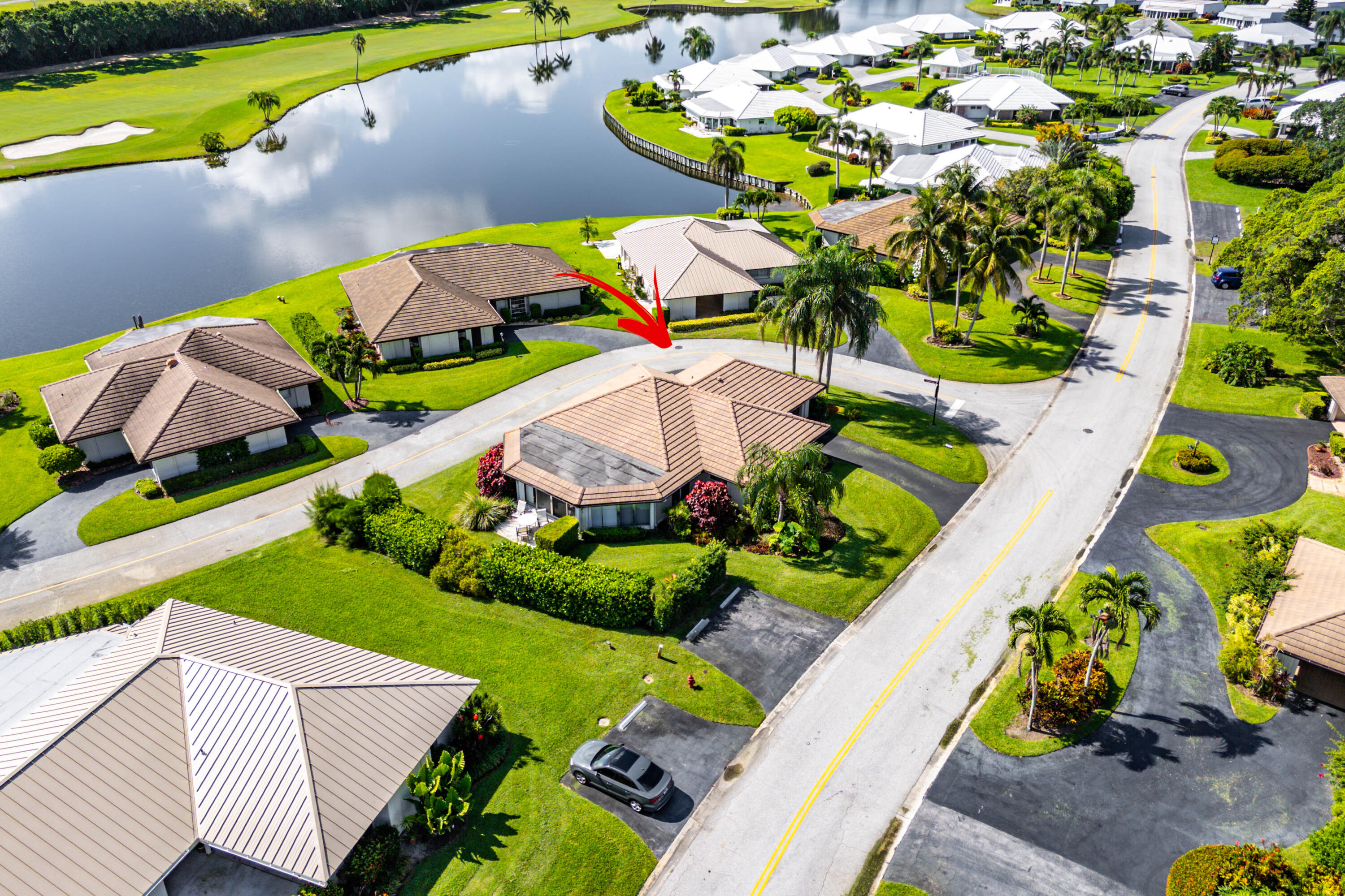 328 Cedar Key Circle Atlantis, FL 33462 - Photo 26 of 28 an aerial view of a house a garden and swimming pool