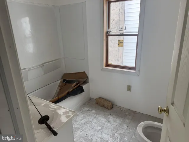 a bathroom with a sink and vanity