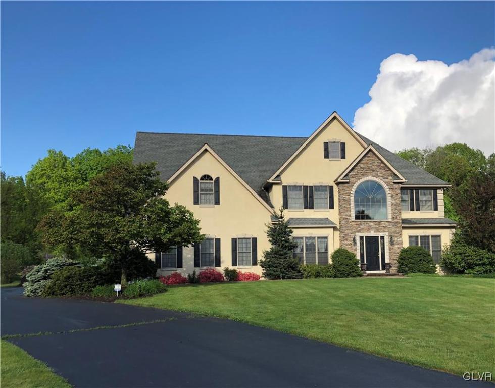453 Colver Road Nazareth, PA 18064 - Photo 1 of 22 a front view of a house with a yard