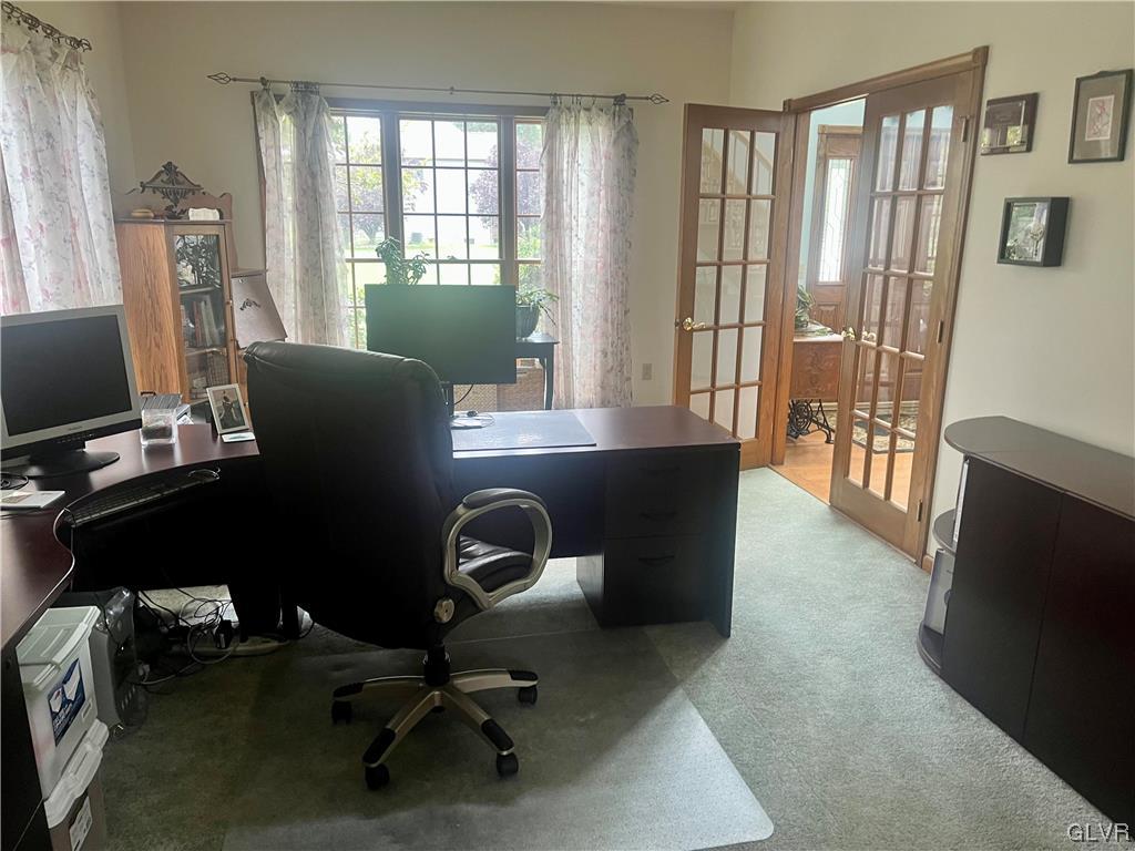 453 Colver Road Nazareth, PA 18064 - Photo 11 of 22 a view of a workspace with furniture and a window