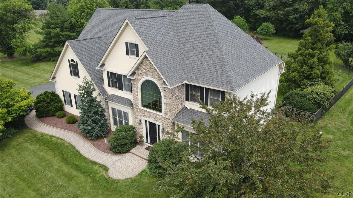 453 Colver Road Nazareth, PA 18064 - Photo 2 of 22 a aerial view of a house next to a yard