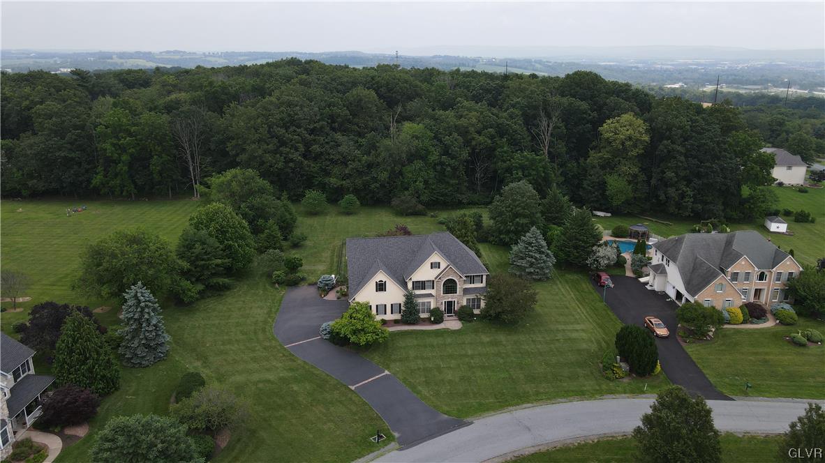453 Colver Road Nazareth, PA 18064 - Photo 22 of 22 an aerial view of a house with a garden and trees