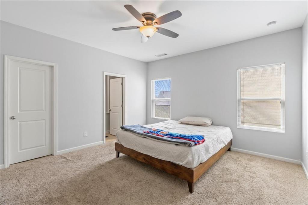 4219 Box Elder Path Gainesville, GA 30504 - Photo 17 of 35 a bedroom with a bed and a window