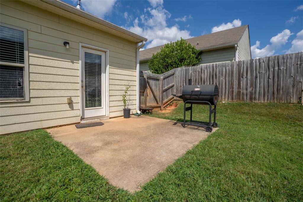 4219 Box Elder Path Gainesville, GA 30504 - Photo 30 of 35 a garden with wooden fence