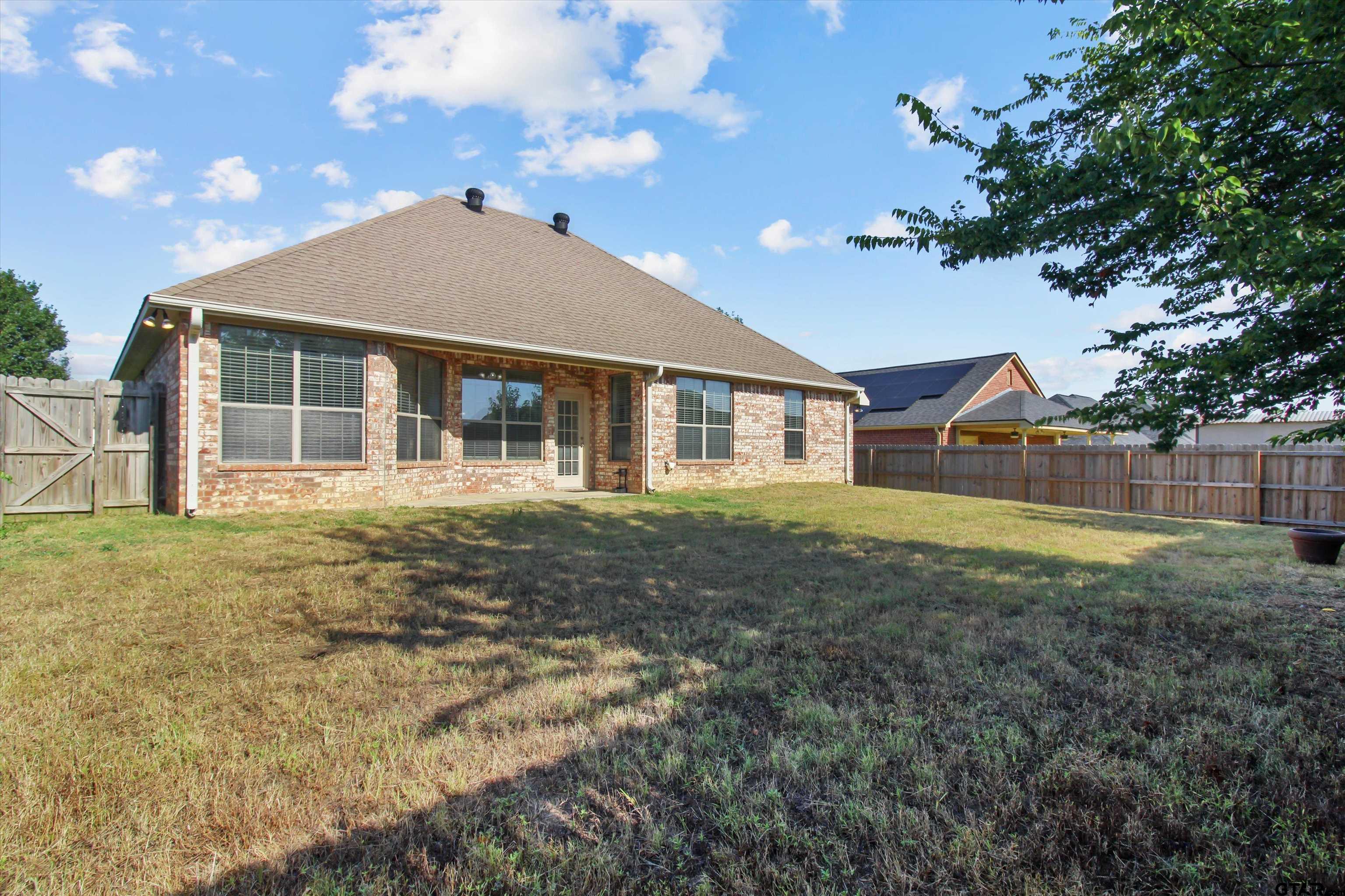 452 Princess Place Tyler, TX 75704 - Photo 20 of 20 a view of a house with backyard and sitting area