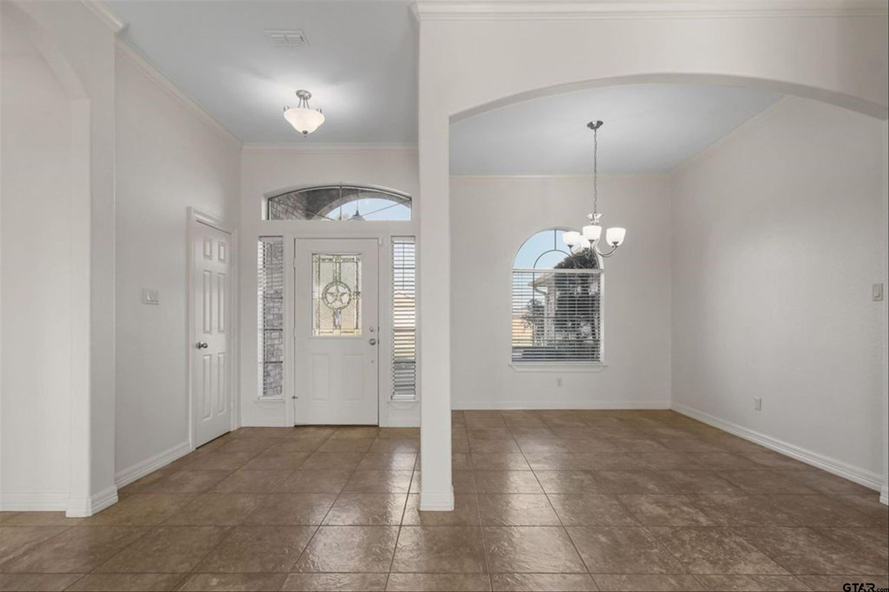 452 Princess Place Tyler, TX 75704 - Photo 3 of 20 a view of a hallway with windows