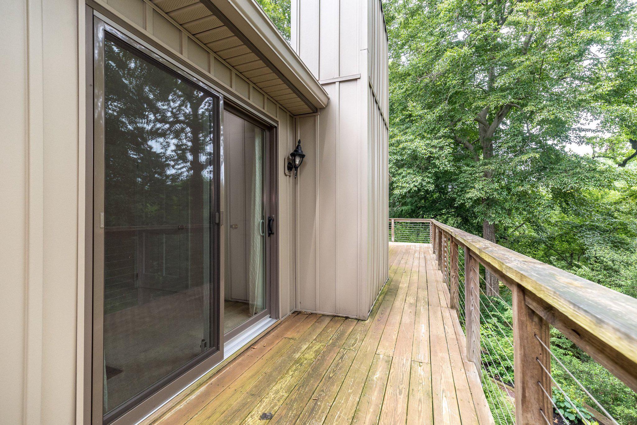 24 Springtree Lane Yardley, PA 19067 - Photo 42 of 84 a view of balcony with wooden floor and fence
