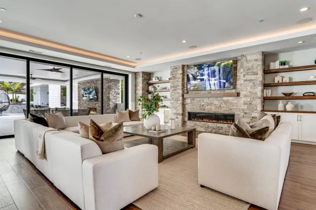 a kitchen with stainless steel appliances granite countertop a stove and a sink