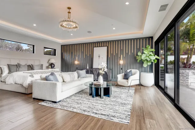 a open kitchen with stainless steel appliances granite countertop a stove a sink and a refrigerator