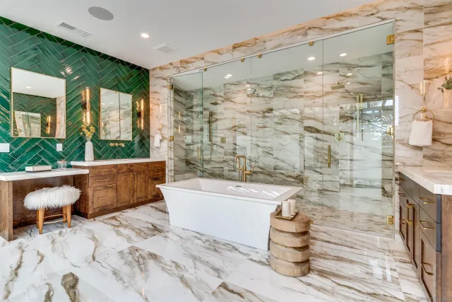 a living room with fireplace furniture and wooden floor