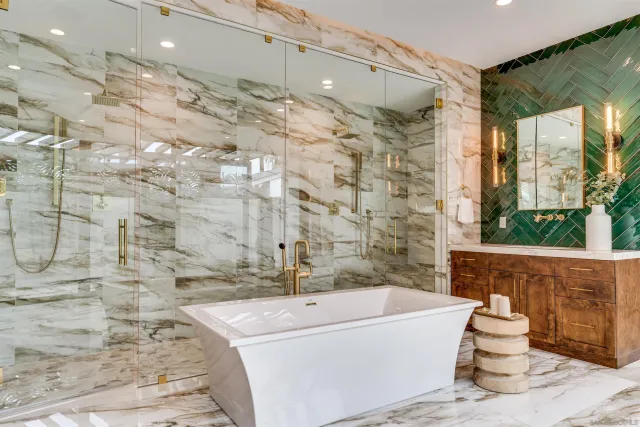 a bedroom with a large bed and a large window