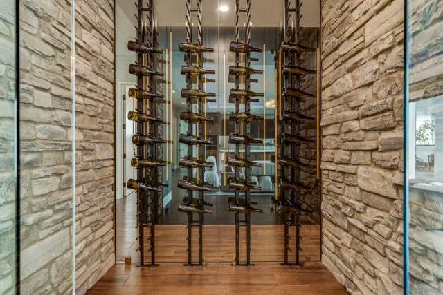 a kitchen with granite countertop a sink and a stove
