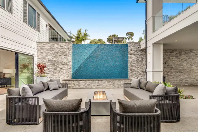a view of a dining room with furniture wooden floor and chandelier