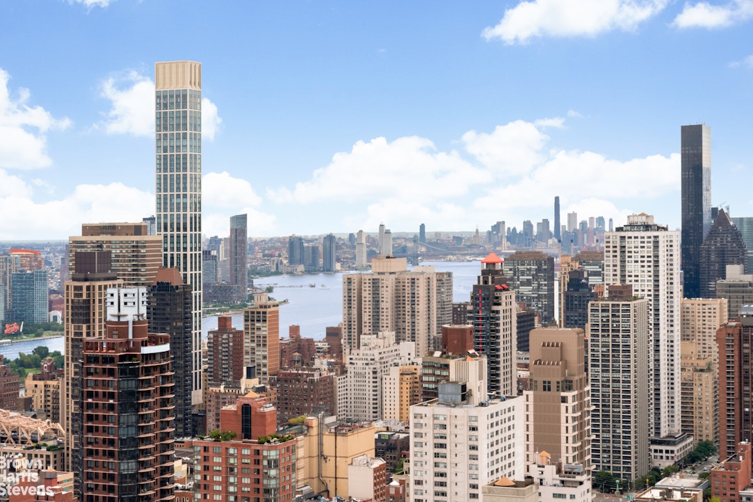 200 East 69th Street, Unit 47 Manhattan, NY 10021 - Photo 26 of 29 a view of a city with tall buildings