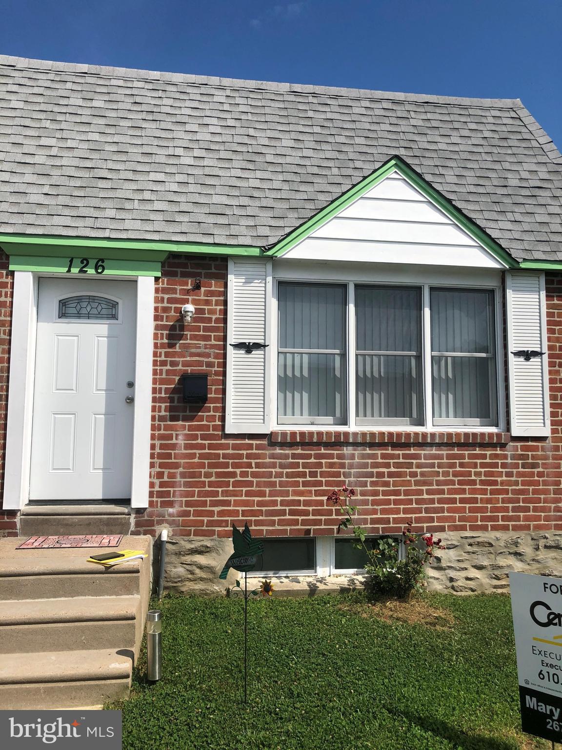 126 Fronefield Avenue Linwood, PA 19061 - Photo 1 of 15 a front view of a house with a yard