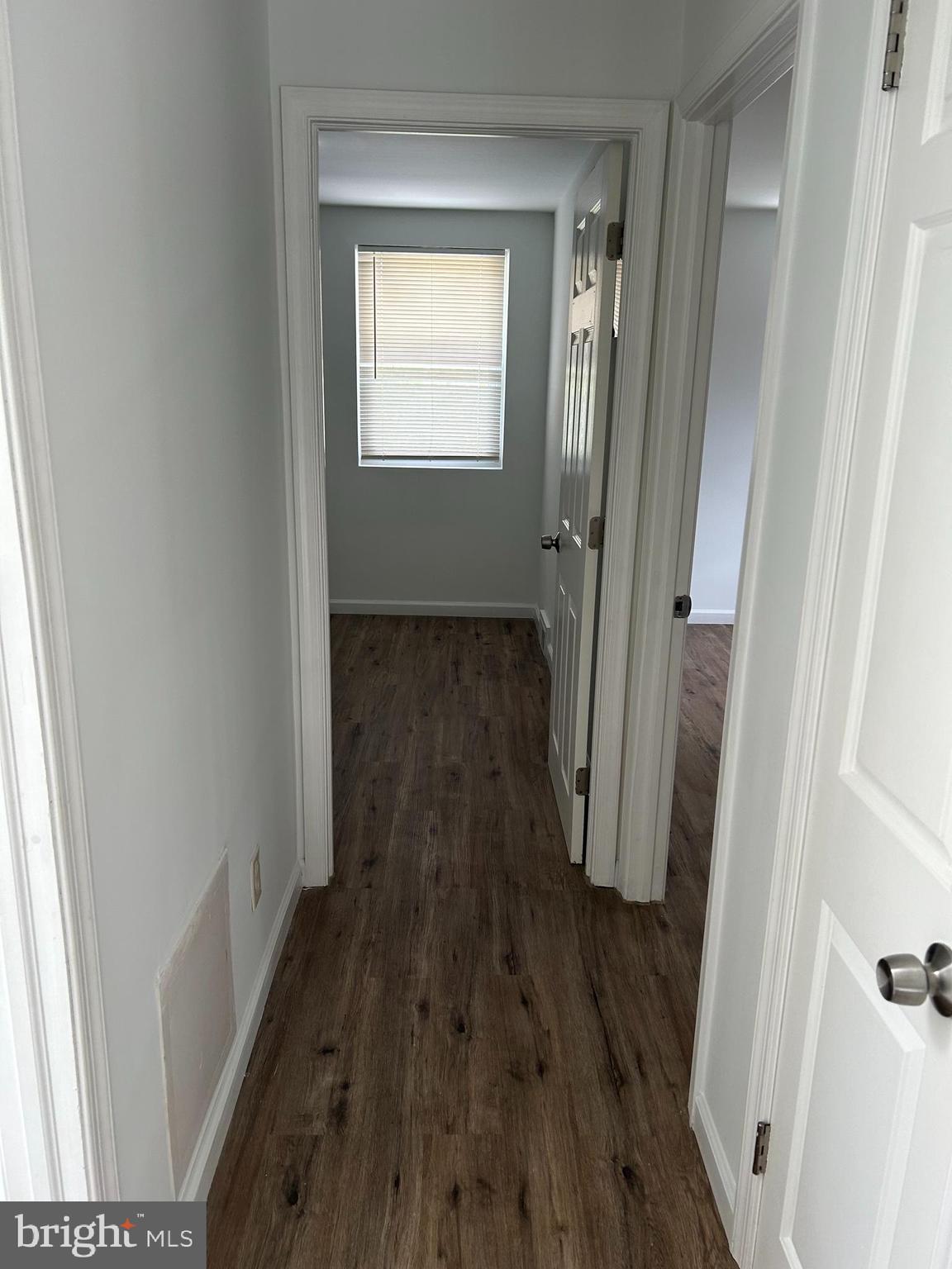 126 Fronefield Avenue Linwood, PA 19061 - Photo 11 of 15 a view of a hallway with wooden floor and staircase