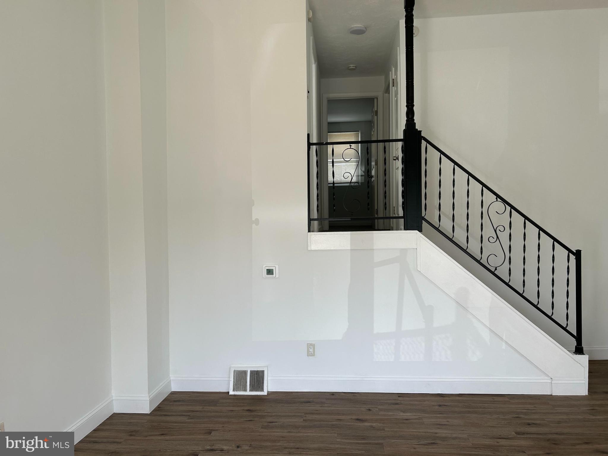 126 Fronefield Avenue Linwood, PA 19061 - Photo 5 of 15 a view of entryway and hall with wooden floor