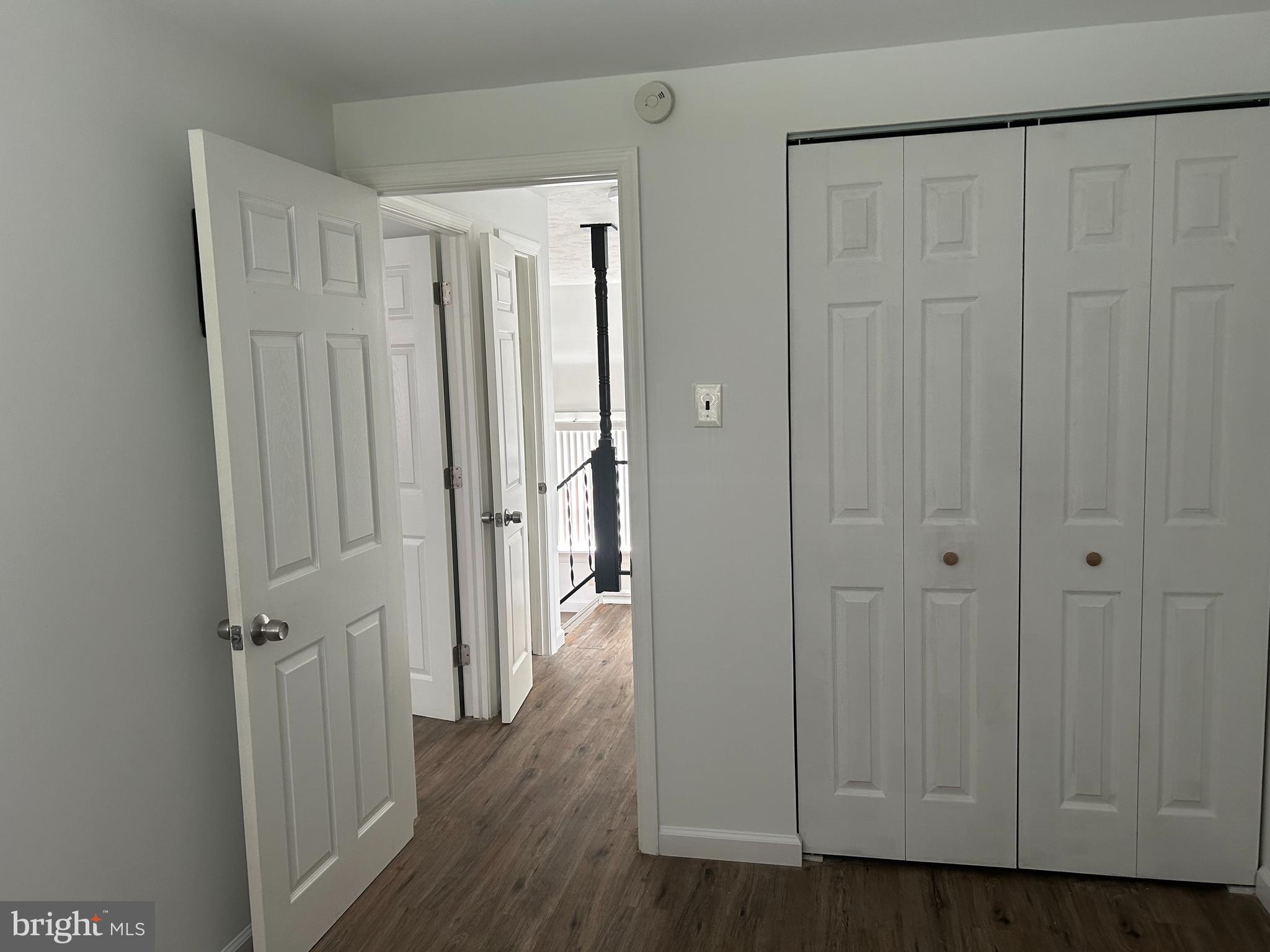 126 Fronefield Avenue Linwood, PA 19061 - Photo 10 of 15 a view of a hallway with wooden floor