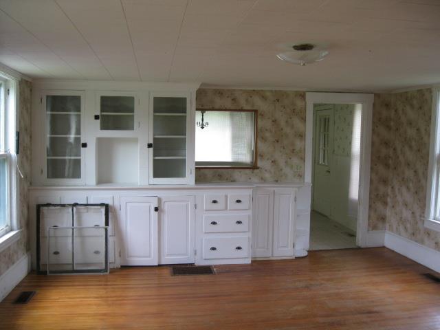 73 Benton Road Albion, ME 04910 - Photo 5 of 20 Living room with built-ins.