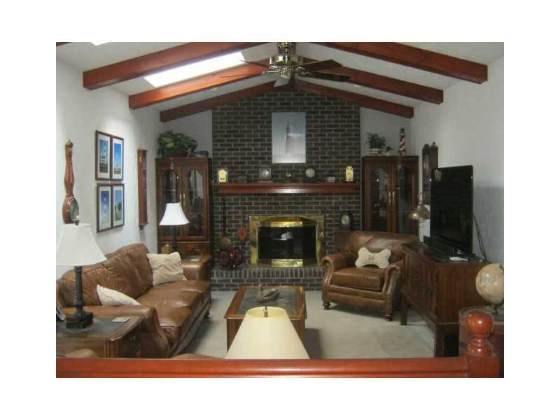 162 Spohn Road Freeport, PA 16229 - Photo 17 of 25 Family Room. Wood beamed ceiling. Log burning fireplace.