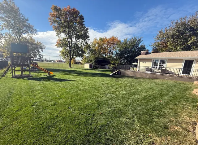 a view of a house with a big yard