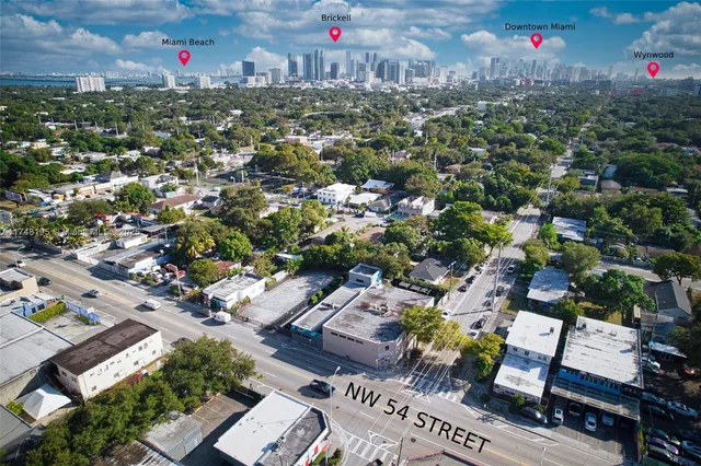 a view of kitchen with wooden floor