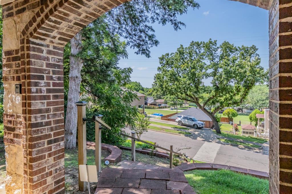 1818 Ebbtide Lane Dallas, TX 75224 - Photo 5 of 33 a view of an outdoor space with garden