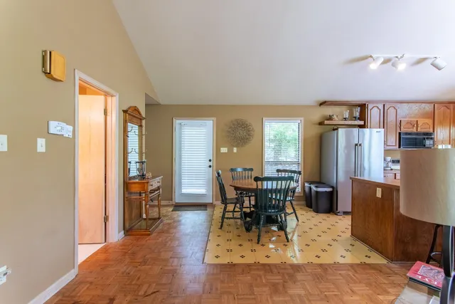 a view of a dining room with furniture