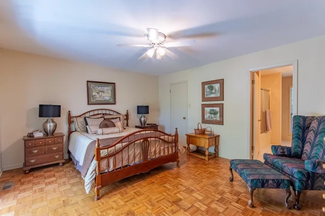 a bedroom with a bed and furniture