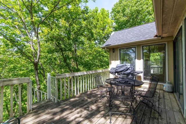 a view of a chairs and table in the deck