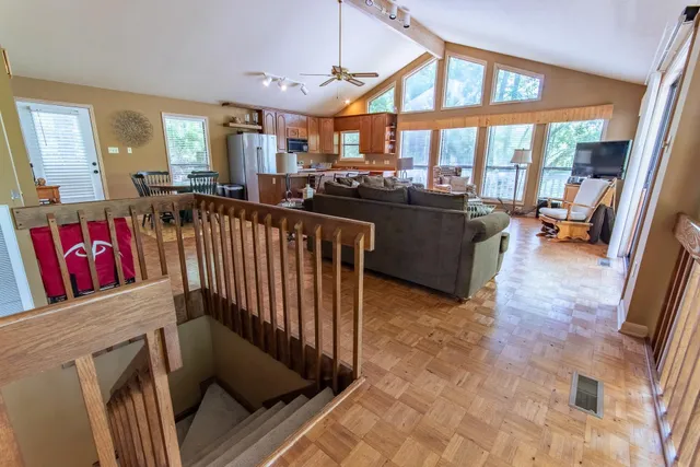 a view of a living room and entry way
