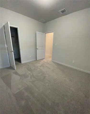 a living room with stainless steel appliances kitchen island furniture and wooden floor