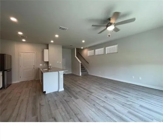 a bathroom with a sink a toilet and a bathtub