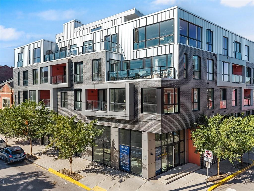 3725 Butler Street, Unit 302 Pittsburgh, PA 15201 - Photo 2 of 44 a front view of a building with balcony