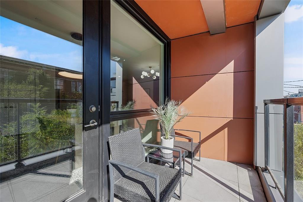 3725 Butler Street, Unit 302 Pittsburgh, PA 15201 - Photo 32 of 44 a view of balcony with wooden floor