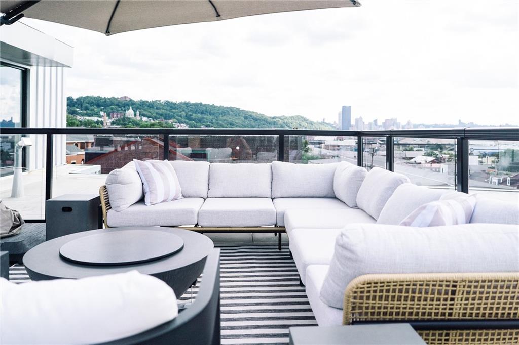3725 Butler Street, Unit 302 Pittsburgh, PA 15201 - Photo 39 of 44 a living room with furniture