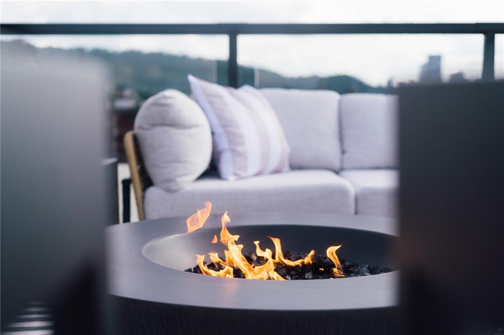 3725 Butler Street, Unit 302 Pittsburgh, PA 15201 - Photo 43 of 44 a bed sitting in a bedroom next to a window