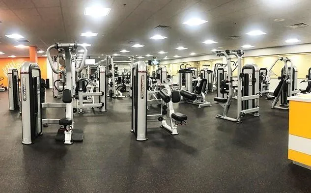 a view of a swimming pool with chairs