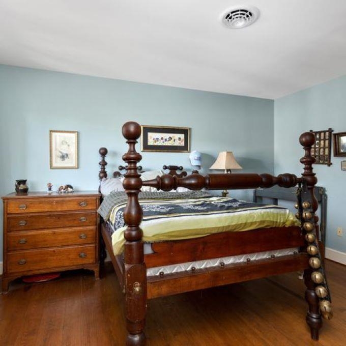 28 Hangers Mill Road Staunton, VA 24401 - Photo 16 of 38 a bedroom with a bed and wooden floor