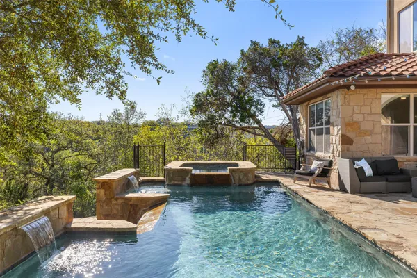 swimming pool view with seating space