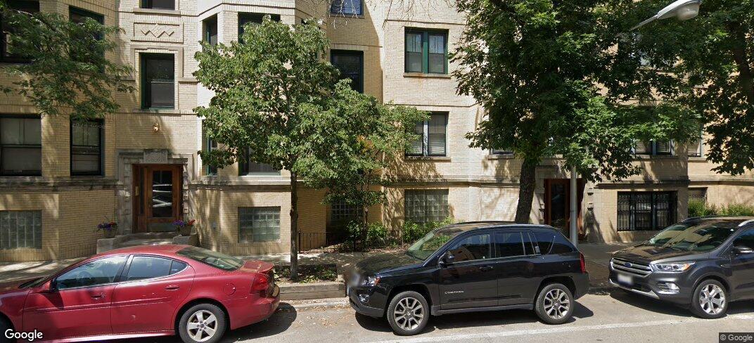 a car parked in front of a house